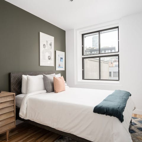 Get some rest in the stylish bedrooms after a busy day exploring Montréal
