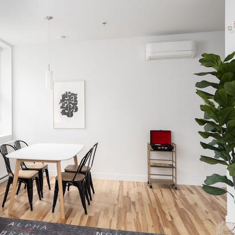 Put some vinyl on the deck and sit at your dining table to enjoy some poutine