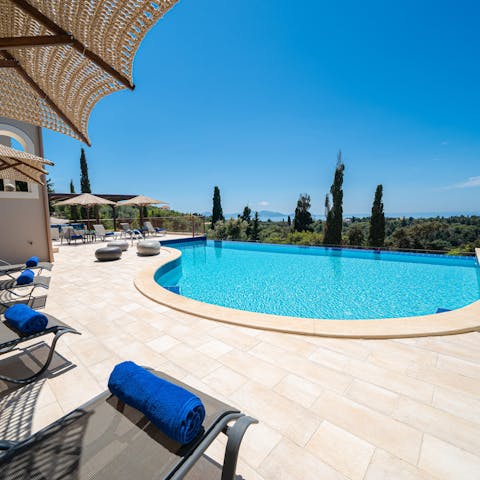 While away the hours by your private swimming pool