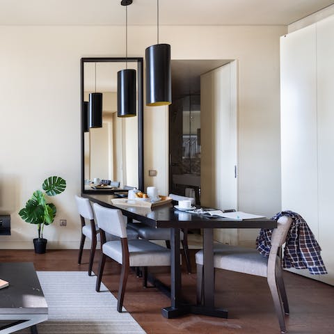 Start mornings with fresh coffee and pastéis de nata at the chic dining table