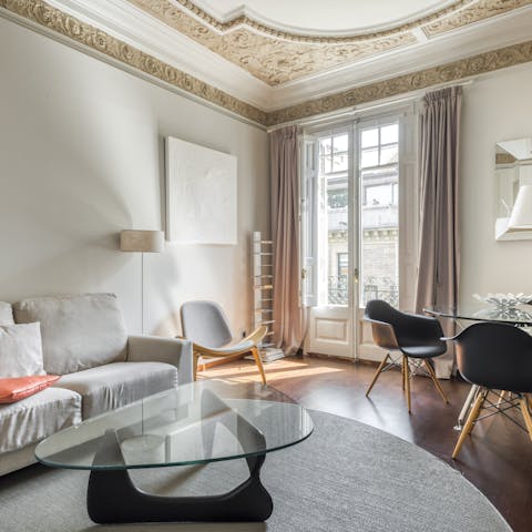 Relax in the living space while admiring its original features