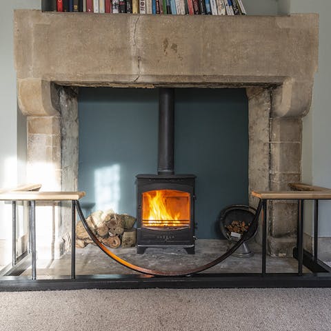 Cosy up by the wood-burning stove