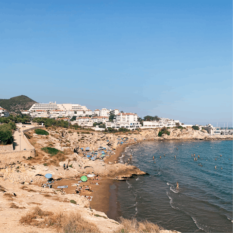 Drive over to the seaside resort of Sitges in fifteen minutes and find a quiet cove