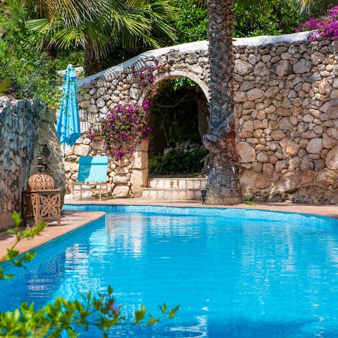 Slip into your swimwear and cool off from the Spanish summer in the swimming pool