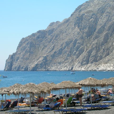 Visit the local beaches, and enjoy the clear waters – Kamari isn't too far away