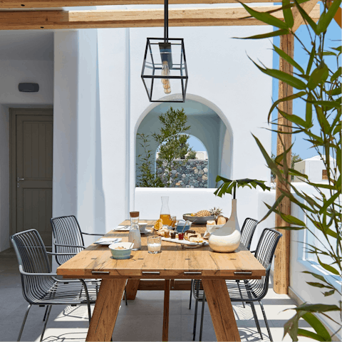 Feast on Greek salad alfresco style on your outdoor dining set
