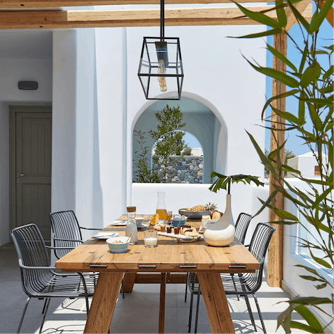 Feast on Greek salad alfresco style on your outdoor dining set