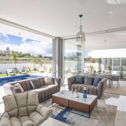 Enjoy movie nights in the plush sofas