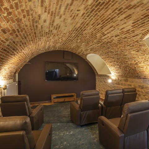 Make some popcorn and gather on the recliners for a movie night
