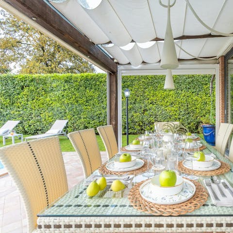 Enjoy a glass of Chianti under the shaded terrace