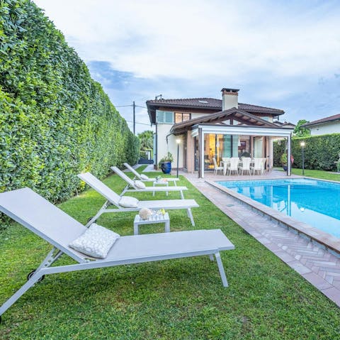 Lounge by the pool with a good novel