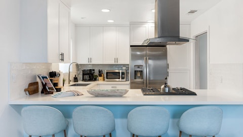 Cook together in the bright, well-equipped kitchen