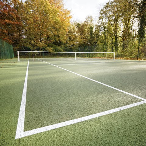 Play a few rounds of tennis with your fellow travellers