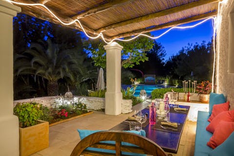 Host a family meal on the outdoor dining area cooked on the barbecue