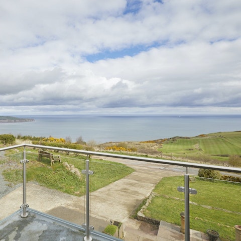 Admire the stunning sea views from the balcony
