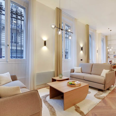 Enjoy a glass of wine as you read curled up on the cosy sofa in the living space