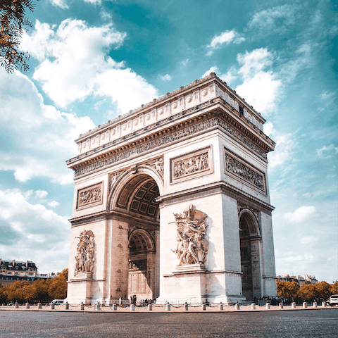 See the majestic Arc de Triomphe up close, easily reachable on foot