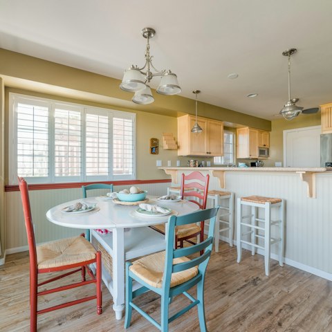 Cook pancakes together in the charming kitchen