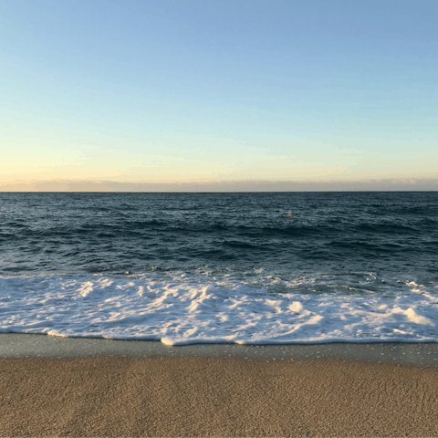Take a ten-minute drive to Arenal Beach