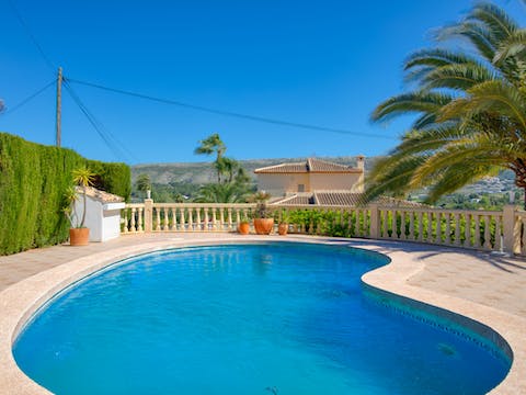 Admire the mountains from the pool
