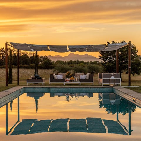 Take sunset cocktails out onto the veranda