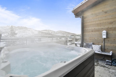 Sink into the private hot tub after a day on the slopes