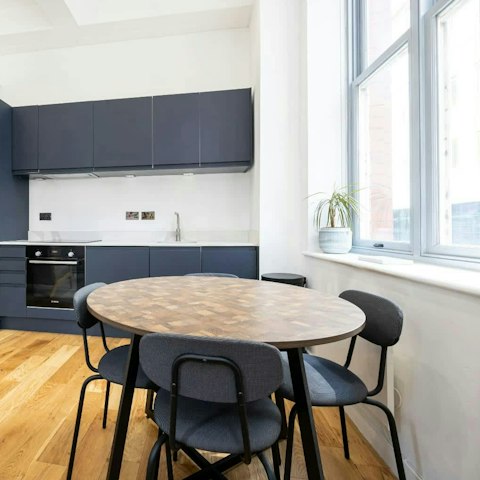 Sit at the dining table to enjoy goodies from the nearby bakery