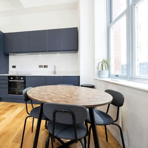 Sit at the dining table to enjoy goodies from the nearby bakery