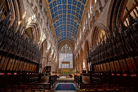 Explore Carlisle Cathedral's medieval architecture and renowned painted ceiling, a twenty-minute drive