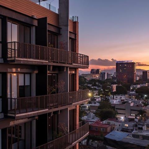 Enjoy a tequila cocktail digestif on the balcony as you watch the sun set