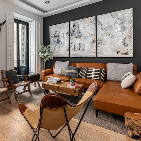 Kick back and relax in the light-filled living space after a day on your feet
