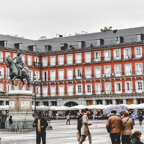 Explore Plaza Mayor, less than a fifteen-minute walk away