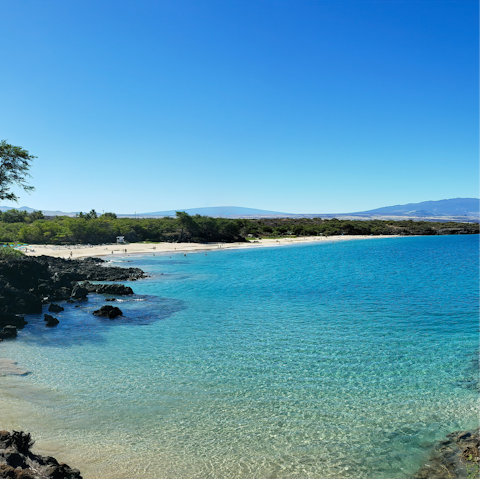Visit heavenly Hapuna Beach, a fifteen-minute drive away