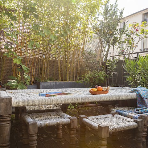 Relax in the bamboo screened garden