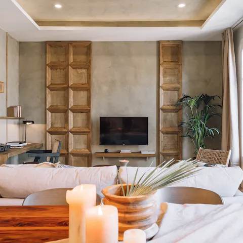 Relax in the stylish living room with a glass of Spanish wine while a record plays