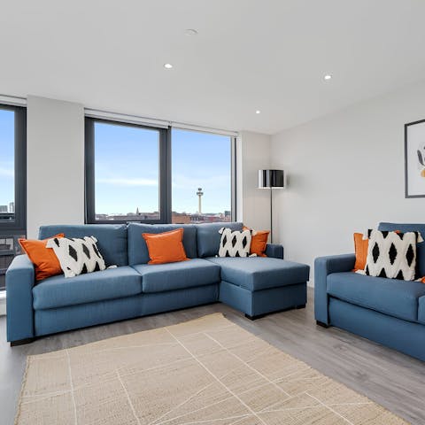 Unwind in the light-filled living space after a busy day of sight-seeing