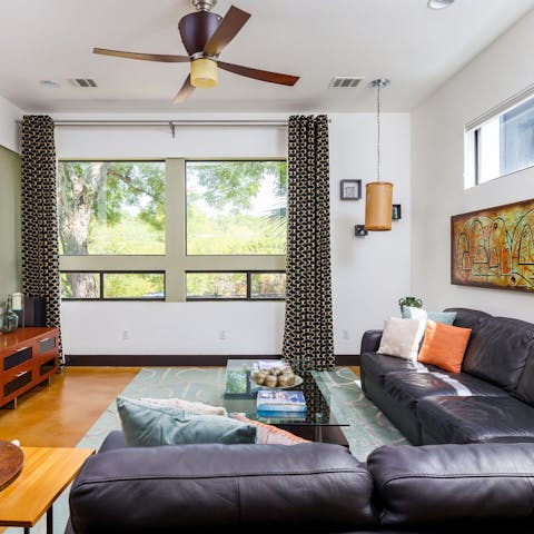 Sprawl out on the leather sofa and rest weary feet