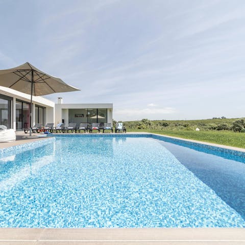 Cool off from the Portuguese sun in the private pool