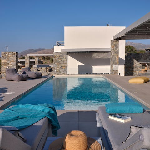 While away sun-kissed afternoons in the private swimming pool