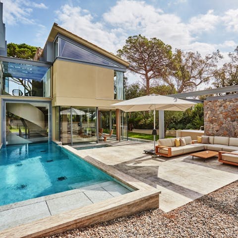 Go for a dip in the pool or seek shade under the umbrella