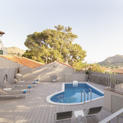 Bask in the sunshine with a cold cocktail in hand on your private pool terrace