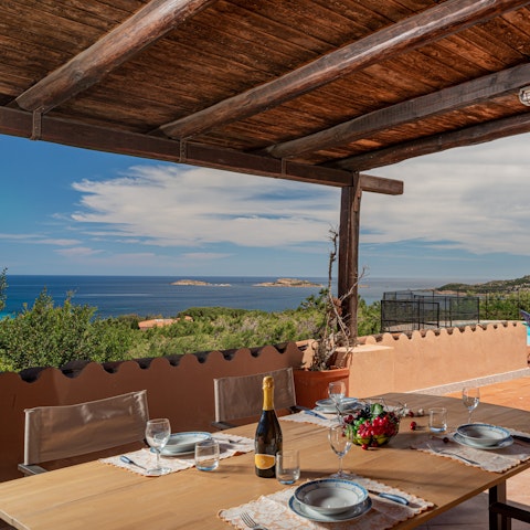 Enjoy an alfresco pasta feast at the covered dining table