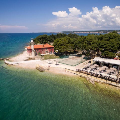 Stroll five minutes to Plaža Borik and sprawl out on the sand