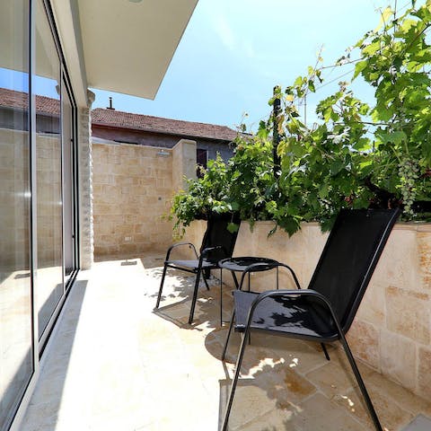 Unwind after a busy day on the small terrace with a glass of Croatian wine