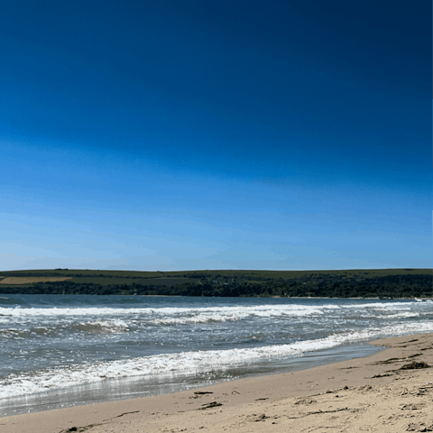 Breathe in the sea air as you stroll along Swanage beach