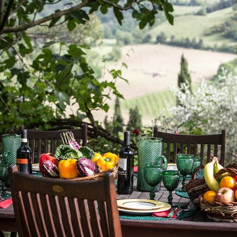 Dine alfresco on an Italian feast and admire the hilltop scenery