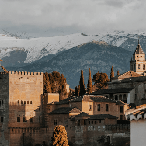 Stay in the heart of the historic old town, just steps away from Granada Cathedral
