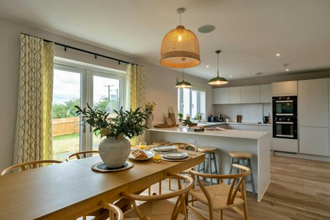 Cook and eat together with doors opening to the garden