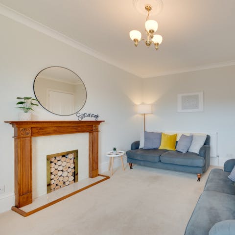 See the Victorian features, including high ceilings and a charming fireplace