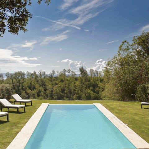 Spend blissful days relaxing by the pool, surrounded by gorgeous greenery, occasionally taking a dip to cool off